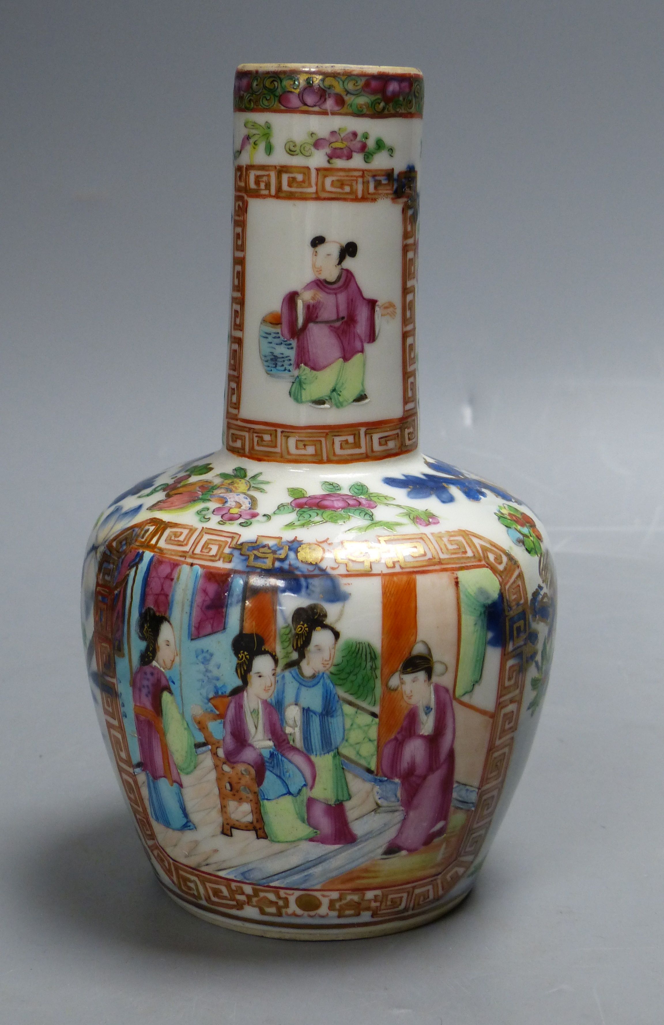 A Chinese famille rose bottle vase, Daoguang period, height 19cm (restored)